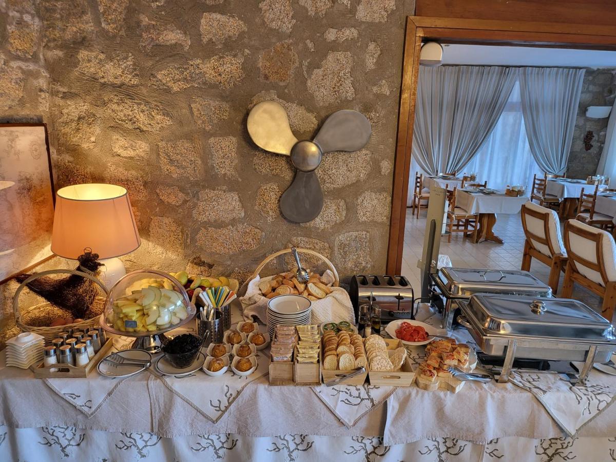 Hotel Olimpia Baja Sardinia Bagian luar foto