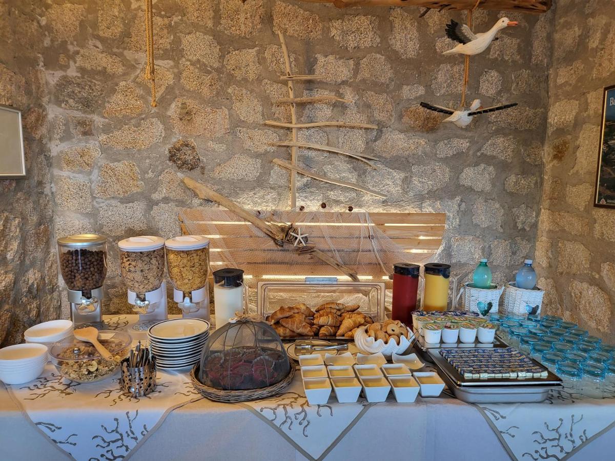 Hotel Olimpia Baja Sardinia Bagian luar foto