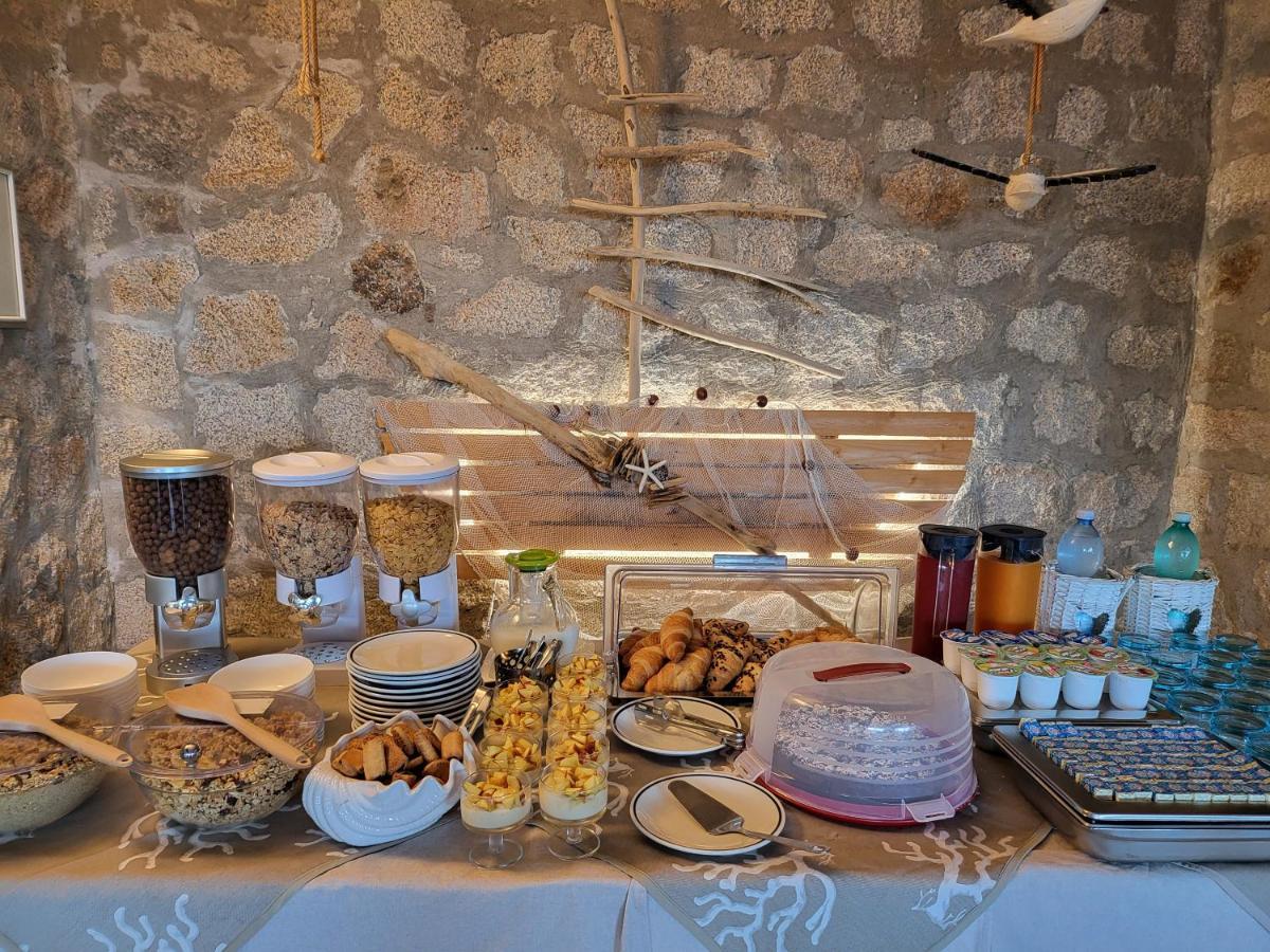 Hotel Olimpia Baja Sardinia Bagian luar foto