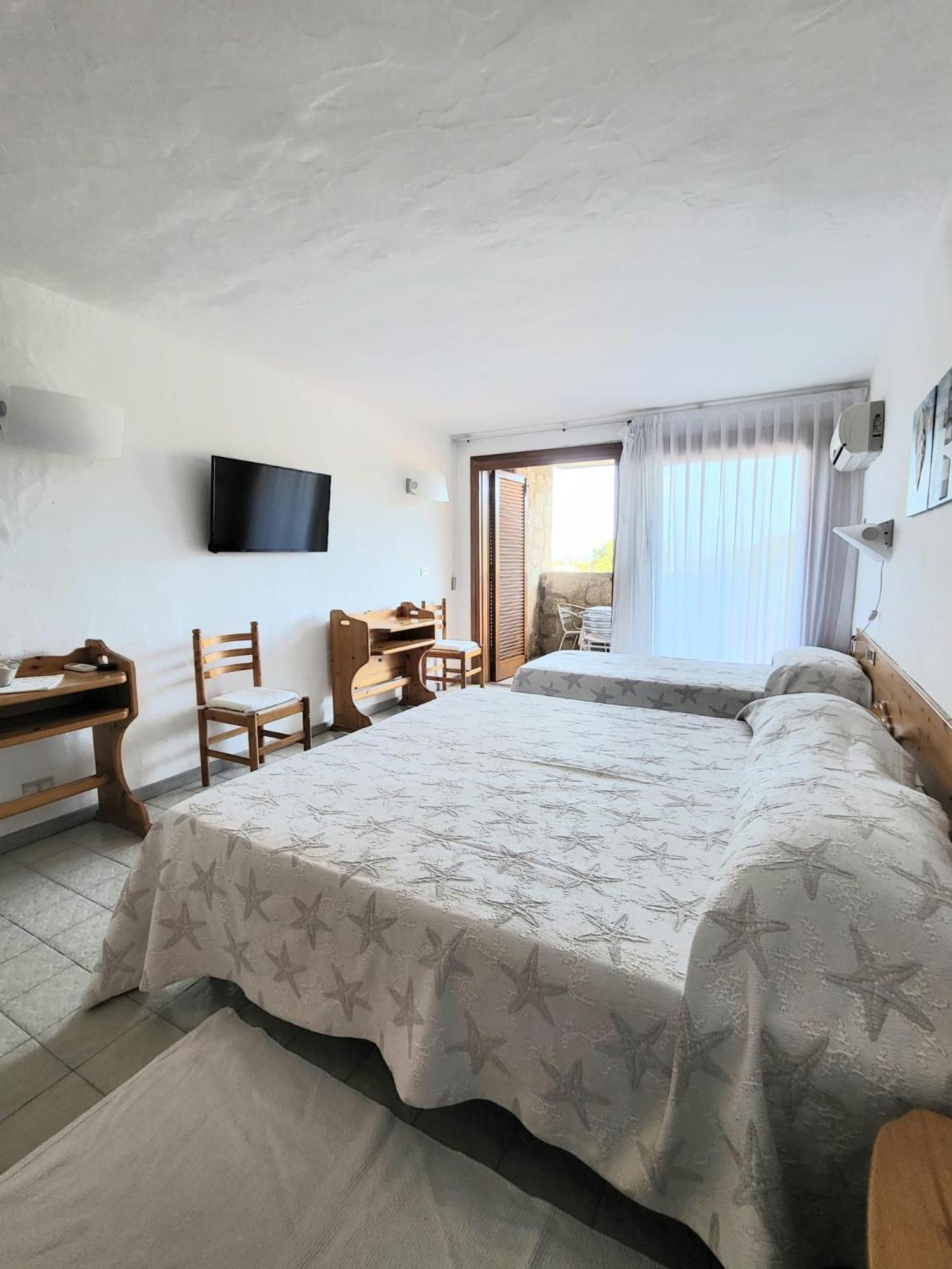 Hotel Olimpia Baja Sardinia Bagian luar foto