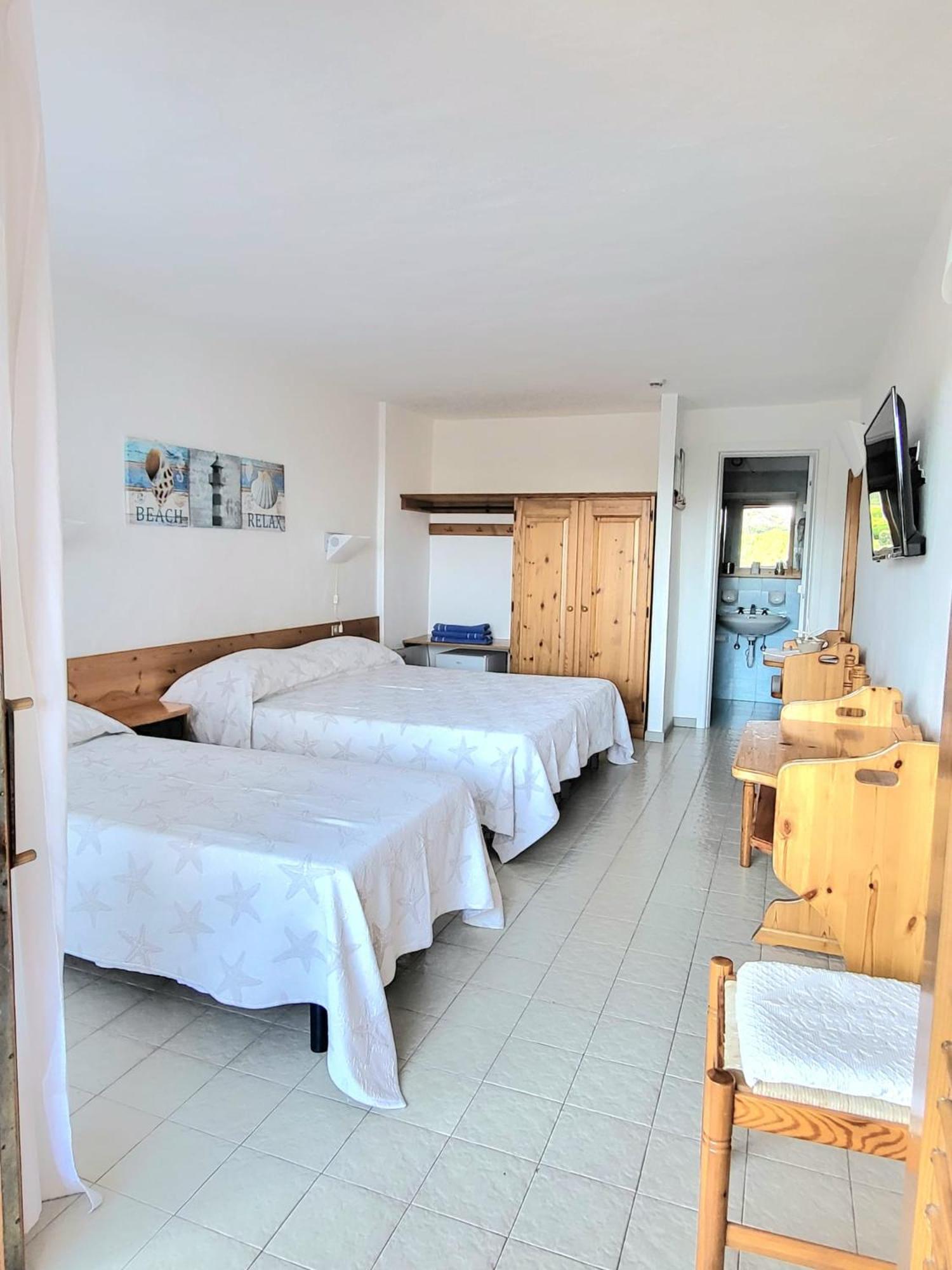 Hotel Olimpia Baja Sardinia Bagian luar foto