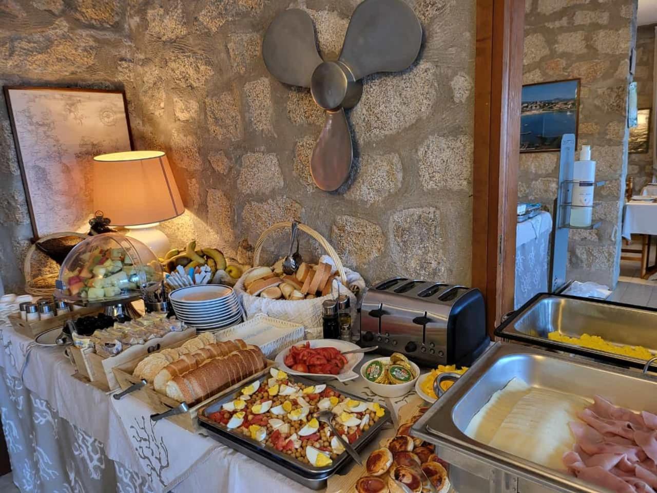 Hotel Olimpia Baja Sardinia Bagian luar foto